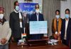 CM Thakur being presented a cheque of Rs.1,00,000 towards CM relief fund by HP health educator association