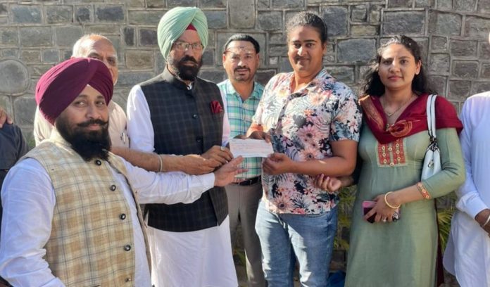 Sports Minister Rana Sodhi hands over cheque