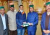 CM presents National Flag to Amit Negi