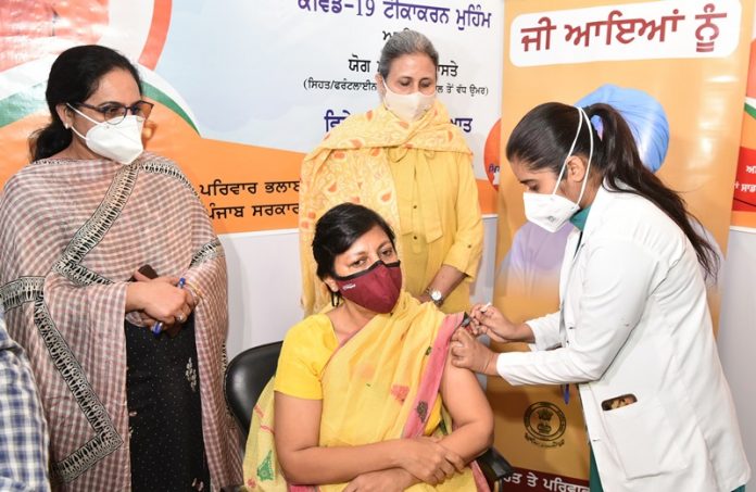 CHIEF SECRETARY GETS FIRST DOSE
