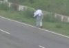 HELPLESS SON TOOK HER MOTHER DEAD BODY ON HIS SHOULDERS TO CEMETERY