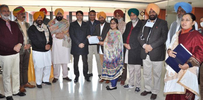 Chairman Kushaldeep Singh Dhillon hands