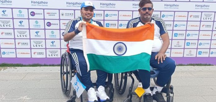 pm congrats two men in archery