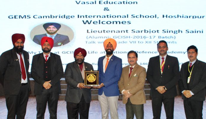 Director Administration Col Manjit Singh. Principal Mr. Sharat Kumar Singh and teachers feliciating Lt. Sarbjot Singh