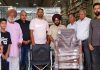 रोटरी क्लब की ओर से दिव्यांग व्यक्ति को की गई व्हील चेेयर भेंट