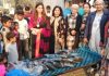 इनर व्हील क्लब ने झुग्गियों में रहने वाले बच्चों को गर्म स्वेटर वितरित किए