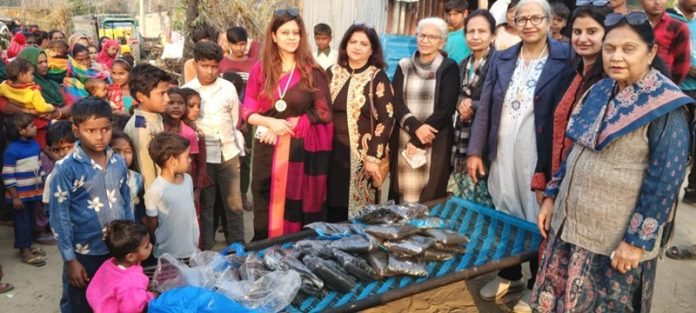 WARM SWEATERS DISTRIBUTED