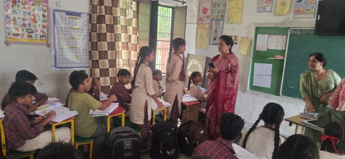 harjinder-kaur-checking-school